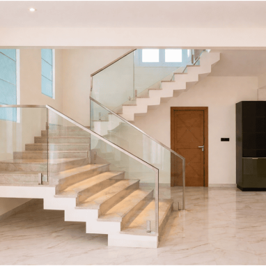 stone and glass hybrid stairs design for villas in devanahalli
